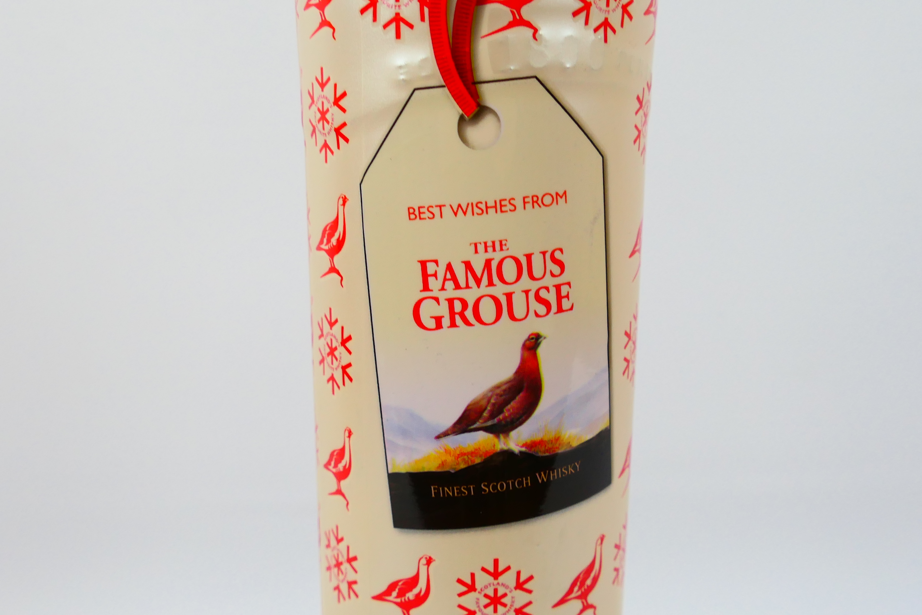 A 70cl Christmas bottling of Famous Grouse, 40% abv. - Image 2 of 4