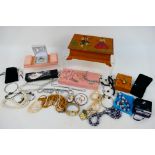 A collection of costume jewellery to include earrings, necklaces and similar.