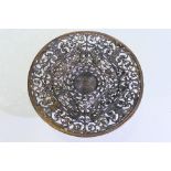 A Coalbrookdale cast iron dish decorated in the classical revival style with hippocampus and mermen,