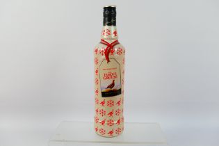 A 70cl Christmas bottling of Famous Grouse, 40% abv.