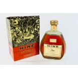 A 24 fl ozs bottle of Hine Antique Cognac Vieille Fine Champagne, 70° Proof, boxed, c.1960's.