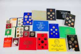 Coin sets and commemoratives to include The Coinage Of Great Britain & Northern Ireland 1973 and