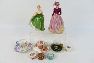 Lot to include a Coalport figure from the Age Of Elegance collection, Hyde Park,