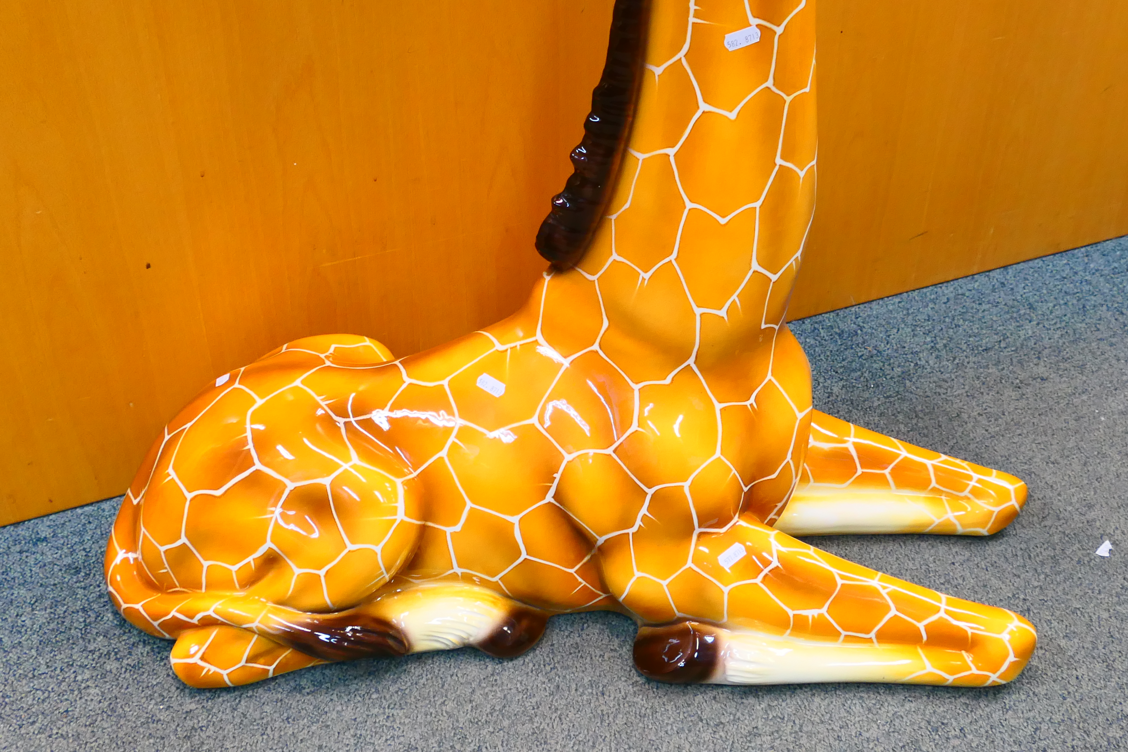 A large Italian ceramic study of a recumbent giraffe, approximately 90 cm (h). - Image 3 of 12