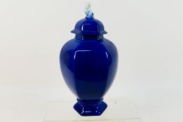 Carlton Ware - A Wiltshaw & Robinson baluster vase and cover of hexagonal section with mottled blue