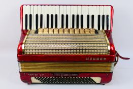 A vintage Hohner Verdi VM piano accordion, 41 keys and 120 basses, marbled red finish,