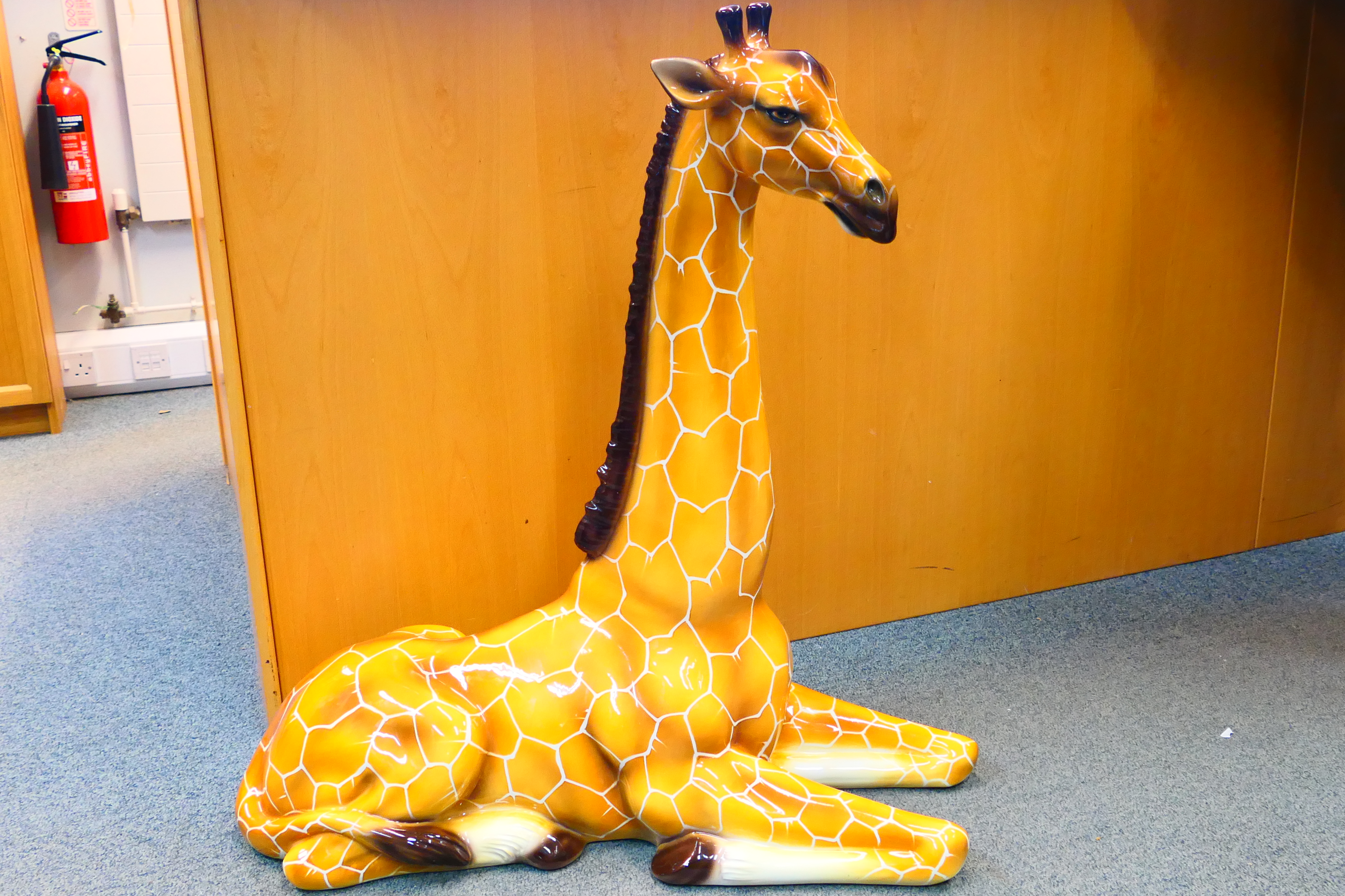 A large Italian ceramic study of a recumbent giraffe, approximately 90 cm (h). - Image 12 of 12