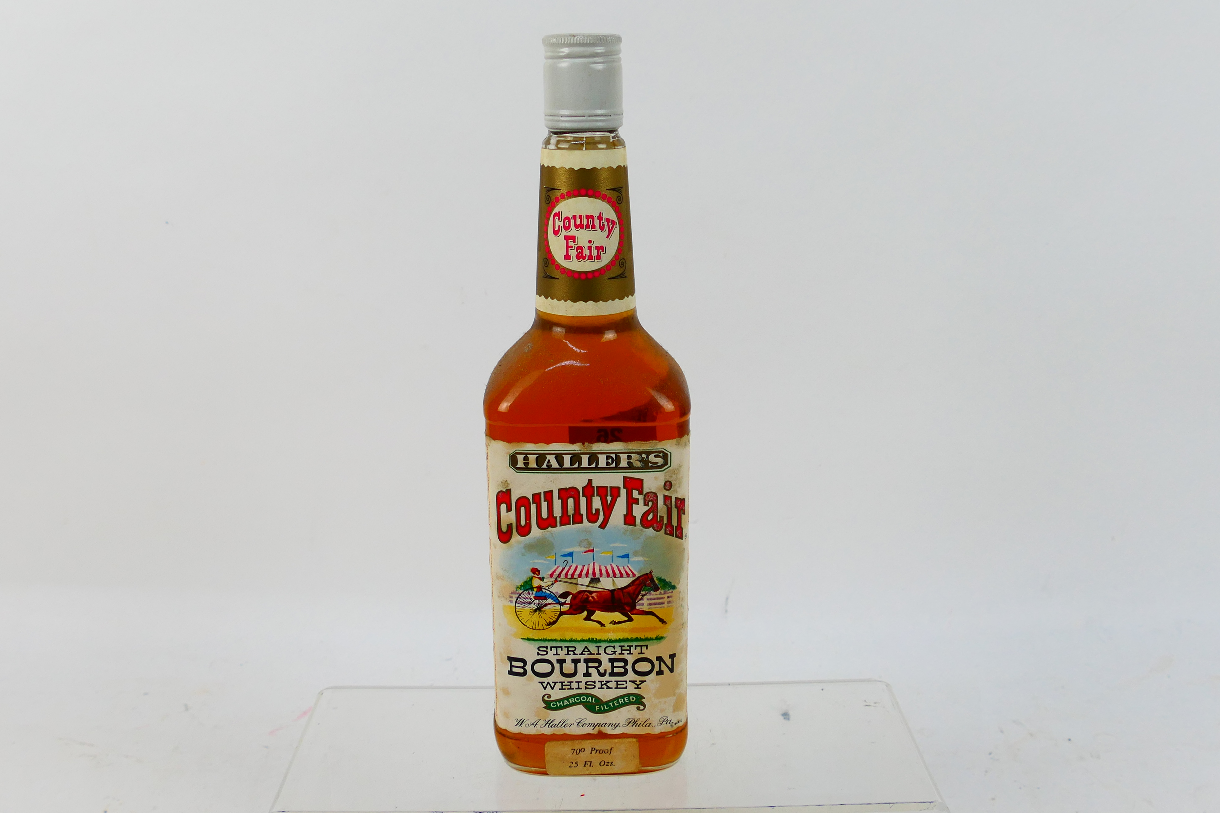 Bourbon - A 25 fl ozs bottle of Haller's County Fair Straight Bourbon Whiskey, 70° Proof,