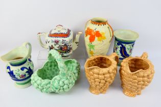 Lot to include two Burleigh Ware jugs in the form of bunches of grapes, a similar basket,