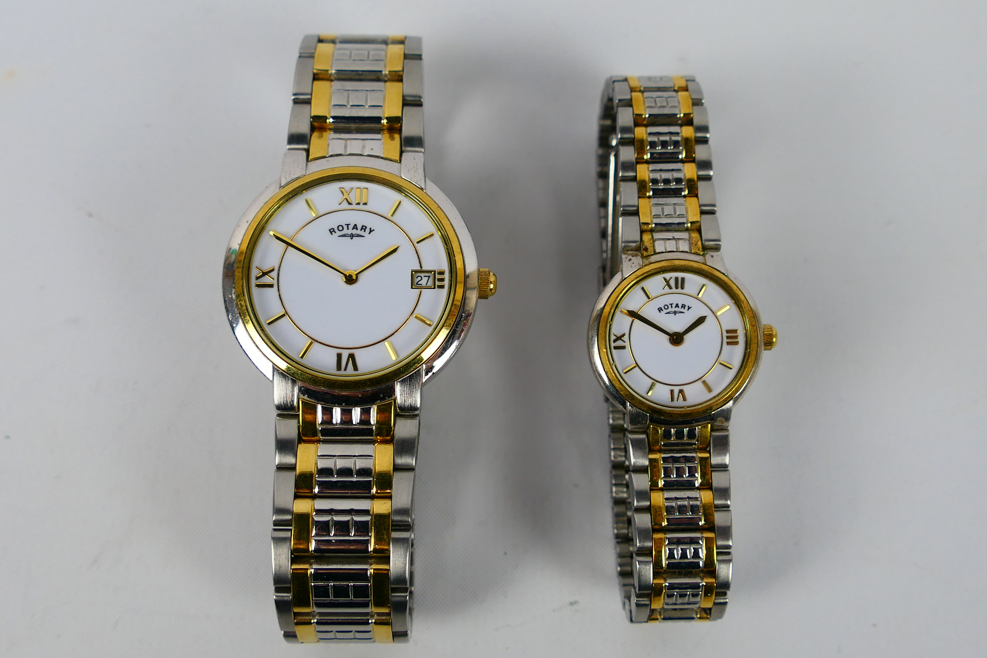 Rotary - Two matching wrist watches, lady's and gentleman's, on stainless steel bracelets.