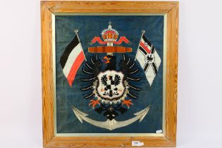 An Imperial German naval embroidery on silk extensively worked with silver bullion,