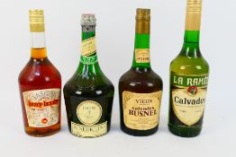 Four bottles of spirits and liqueur,