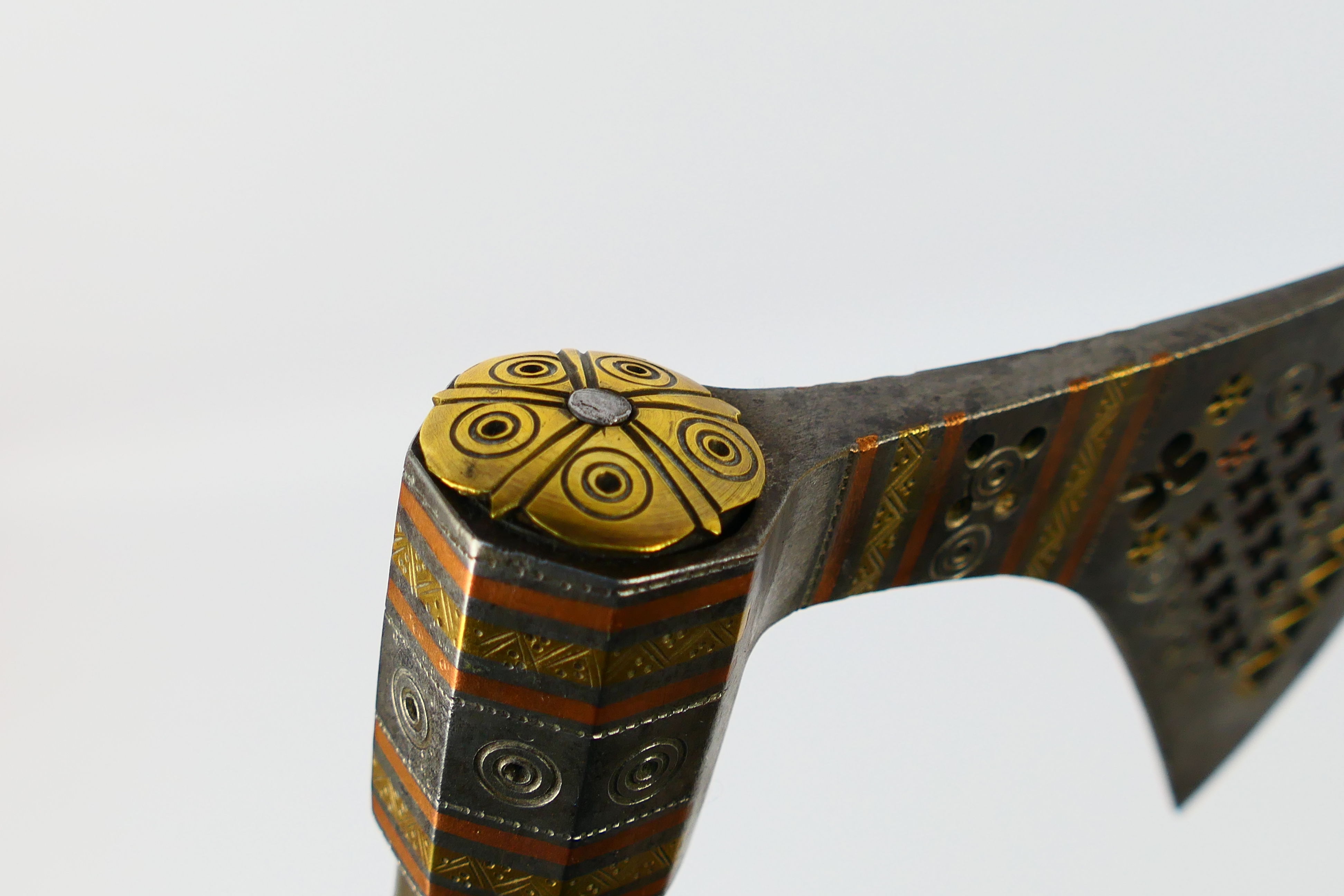 A North Indian axe (Tabarzin) with pierced wedge shaped head on brass mounted wooden haft, - Image 9 of 9