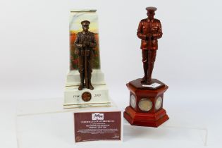 Two World War One (WW1 / WWI) commemorative bronzed sculptures comprising a Danbury Mint For The