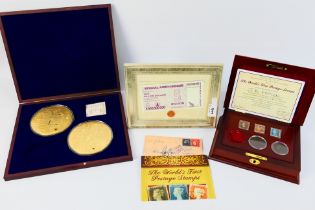 Two large size gold plated commemorative coins from the Icons Of A Nation series comprising