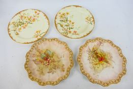 Two late 19th or early 20th century Royal Crown Derby cabinet plates decorated with floral sprays