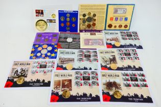 A collection of First World War commemorative coin covers (six) and a quantity of coin sets to