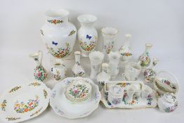 A collection of Aynsley ornamental wares to include vases, dishes, basket, jugs and similar,
