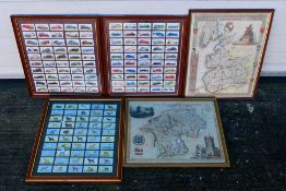 Three framed cigarette card displays comprising motorcars and dogs, and two framed maps,