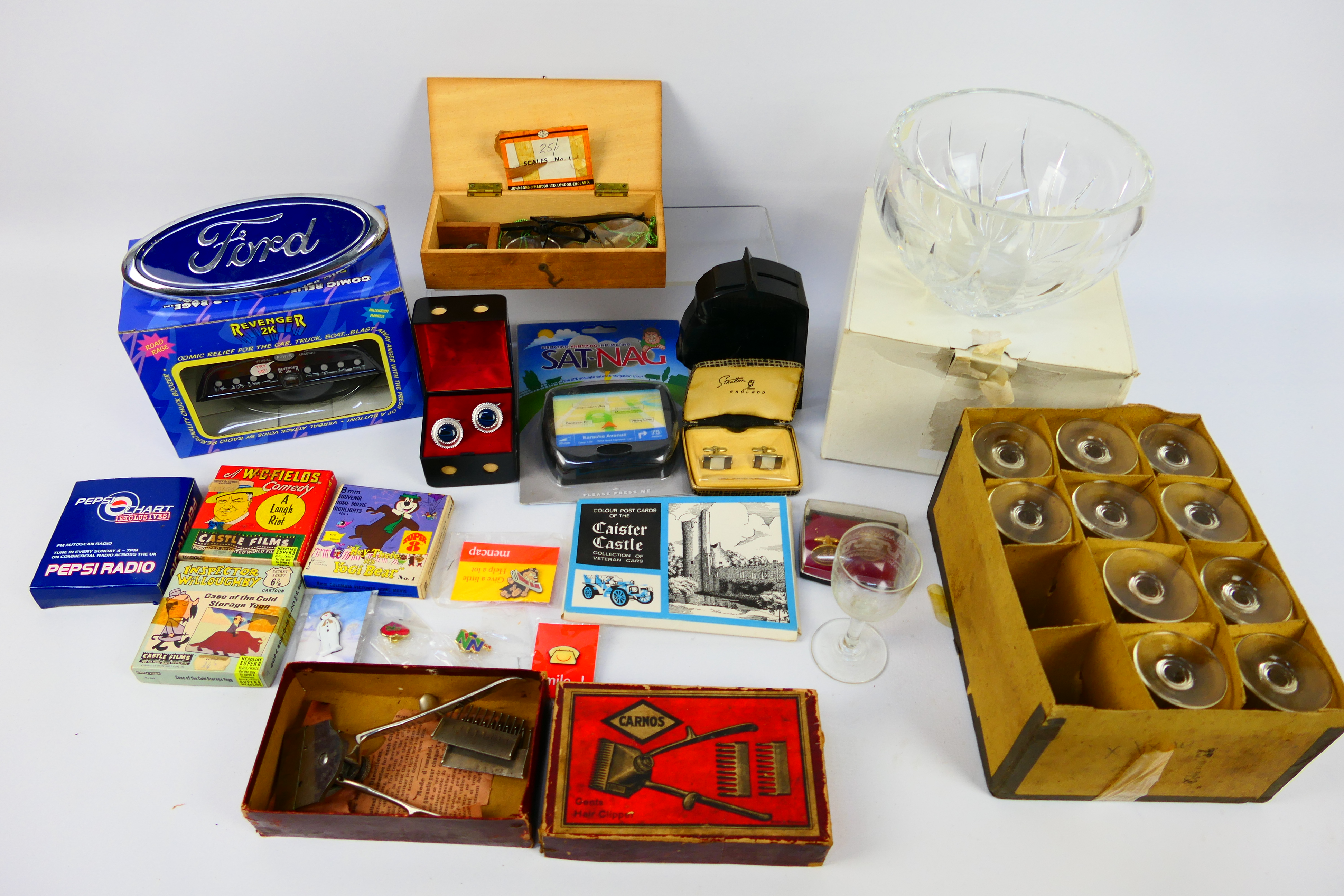 Lot to include glassware, vintage hair clippers, 8mm film reels, scales, cufflinks and other.