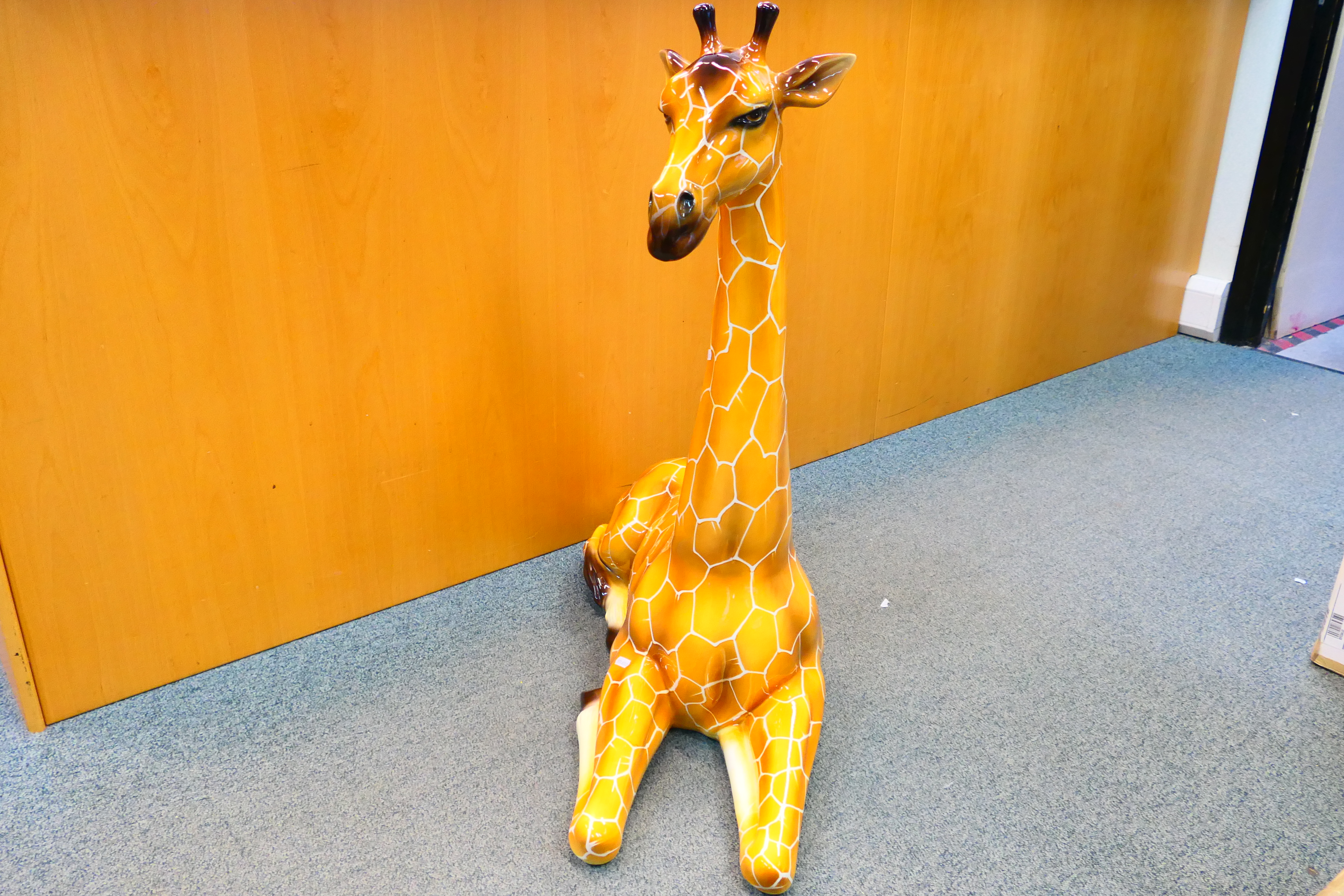 A large Italian ceramic study of a recumbent giraffe, approximately 90 cm (h). - Image 6 of 12