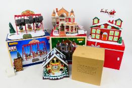 Two boxed Lemax Christmas Village illuminated models comprising Village Park Swing Boats and The