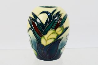 Moorcroft - A Moorcroft Pottery vase decorated in the Bullrush And Water Lily pattern, 1996,