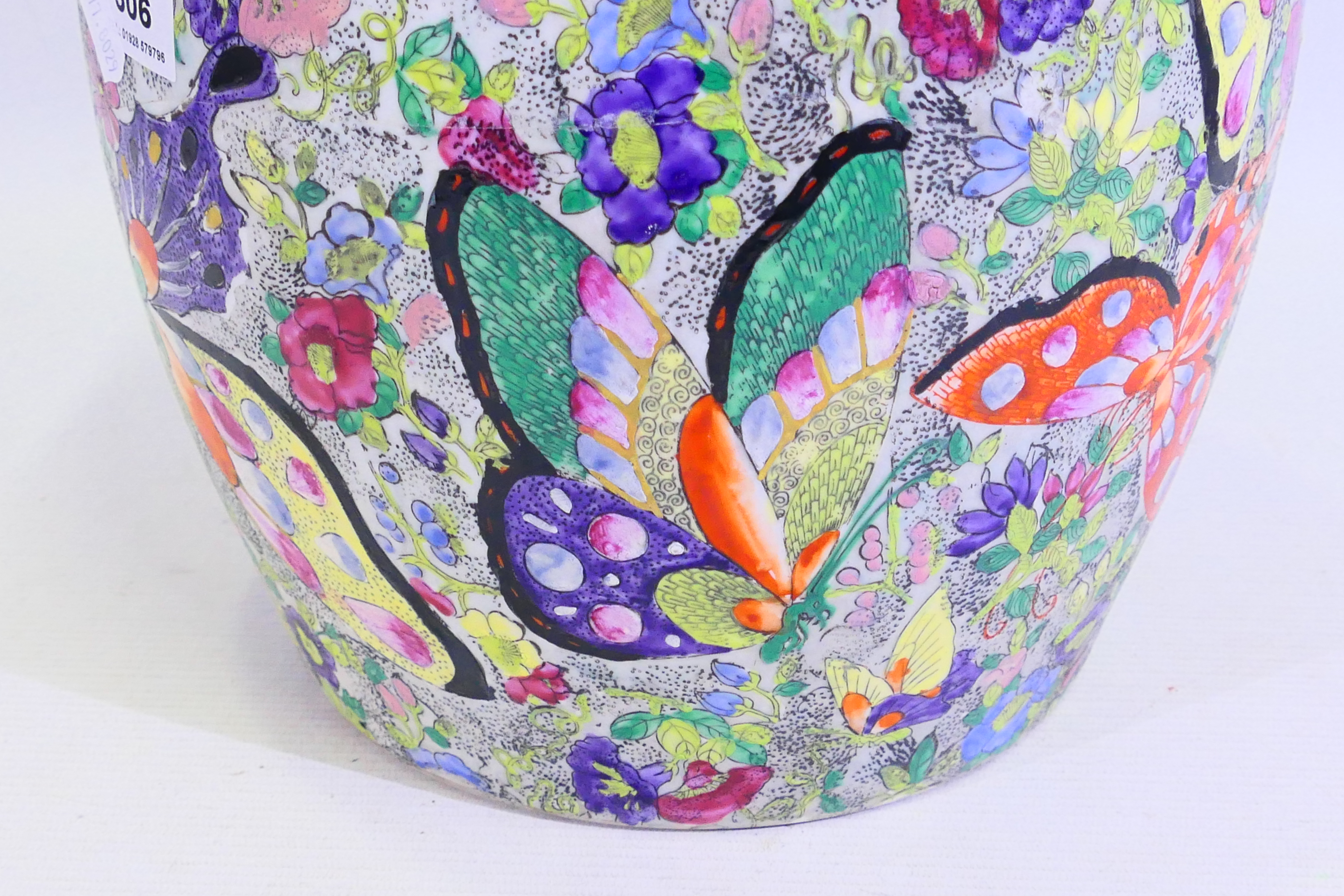 A large Japanese vase decorated with numerous butterflies amidst flora, signed to the base, - Image 7 of 14