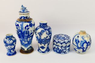 A collection of blue and white vases (one with cover) comprising one Bogu pattern example,