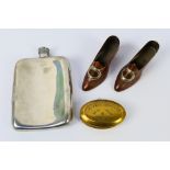 An early 20th century brass snuff box of oval form,