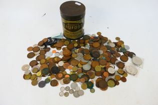 A collection of UK and foreign coins, Victorian and later, some silver content noted.