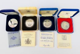 Four silver proof coins comprising The Silver Jubilee Commemorative Medal,