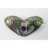 An Art Nouveau silver and enamel brooch by Charles Horner (losses to the enamel),