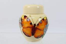 Moorcroft - A Moorcroft Pottery jar and cover, 1994,