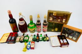 A collection of spirits and similar to include whisky and brandy miniatures, Polish Cherry Vodka,