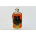 A 26⅔ fl ozs bottle of Glen Grant 21 Years Old Director's Reserve, 80° proof,