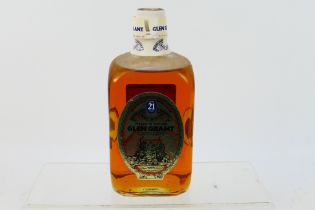 A 26⅔ fl ozs bottle of Glen Grant 21 Years Old Director's Reserve, 80° proof,