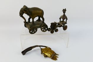 An Asian bronze depicting an elephant on carriage, approximately 14 cm (h),