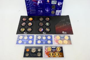 A quantity of US coin sets to include John F Kennedy May 29th 1917 - November 22nd 1963,
