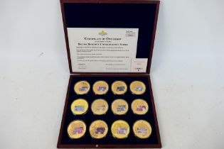 A Windsor Mint British Banknote Commemorative Strike set comprising twelve gold plated coins each