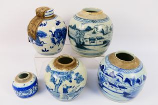 A collection of Chinese blue and white jars (one with cover),