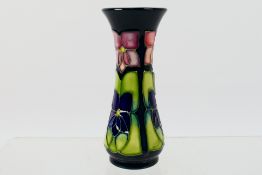 Moorcroft - A small Moorcroft Pottery vase, decorated in the Violet pattern,
