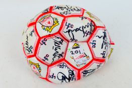 Liverpool Football Club - A Liverpool branded football bearing signatures (signatures unverified),