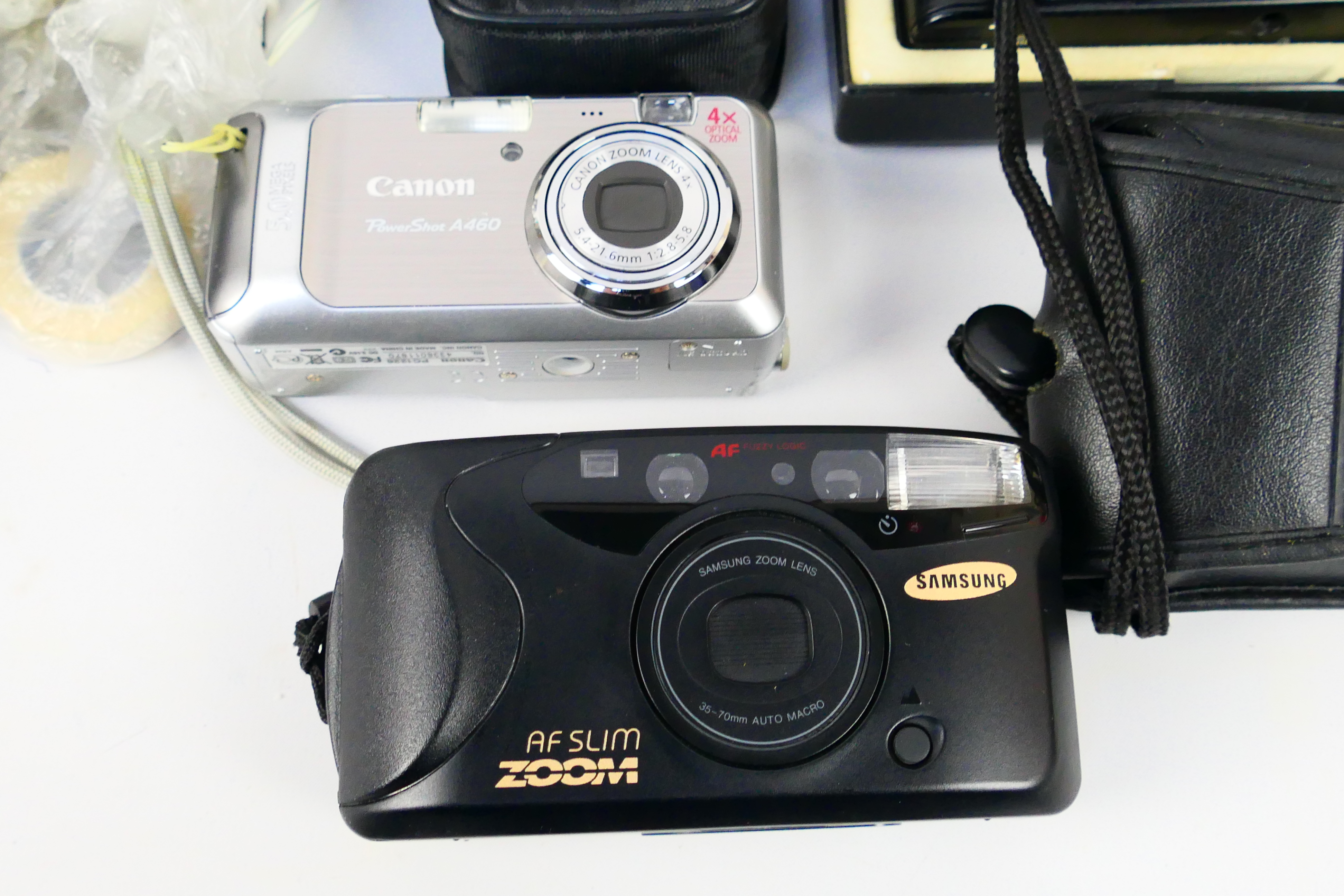 Photography - A small collection of cameras to include an Olympus XA2 with an A11 Flash contained - Image 3 of 7