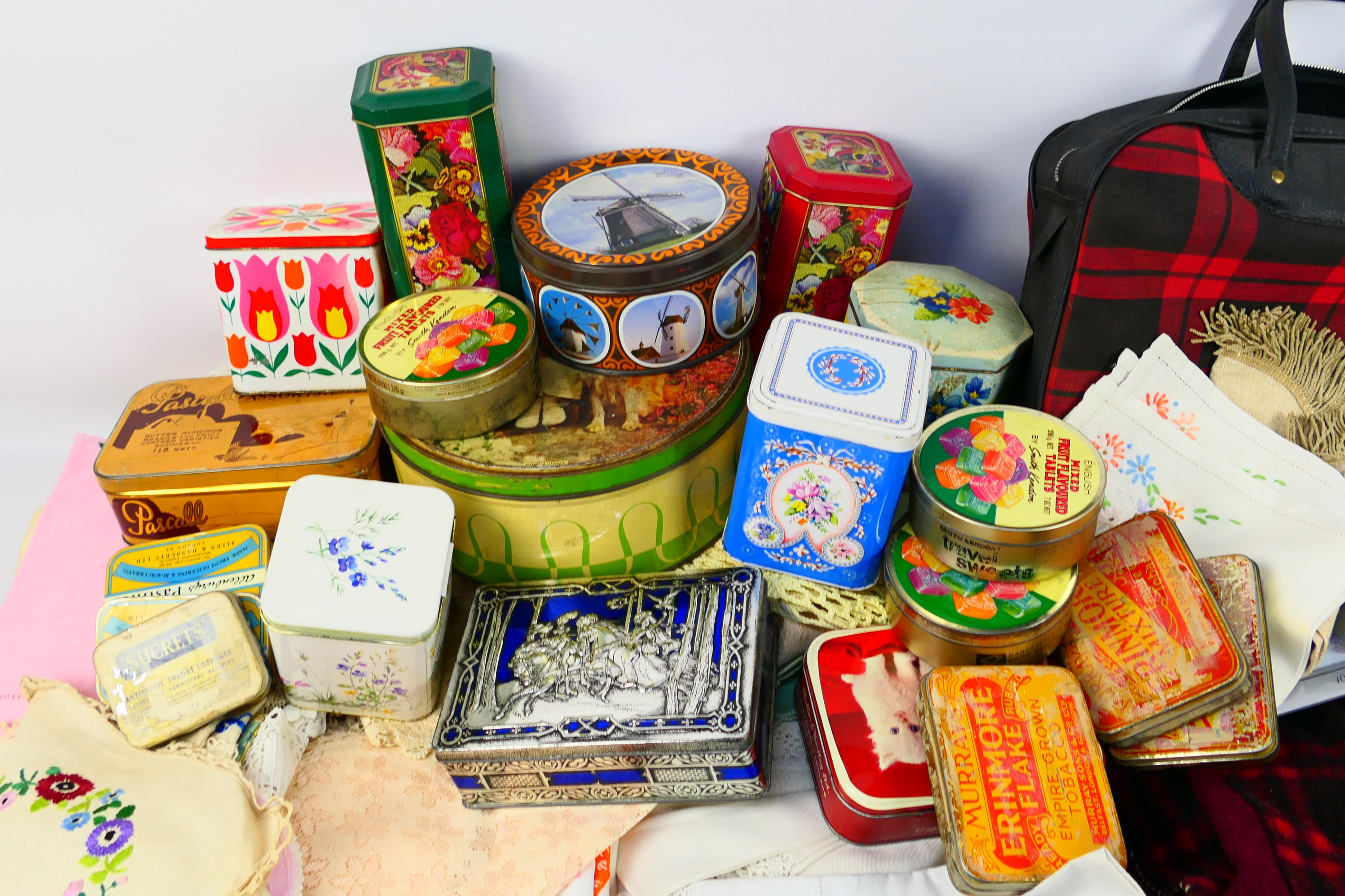 A quantity of vintage linen, knitting patterns, confectionary and similar tins. [2]. - Image 2 of 6