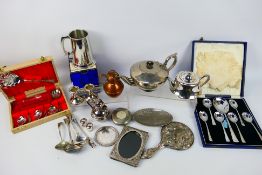 A collection of various metalware, predominantly plated, cased flatware and other.