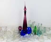 A large quantity of coloured and regular glassware.