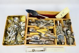 A collection of various flatware comprising plated and stainless, antique and later.