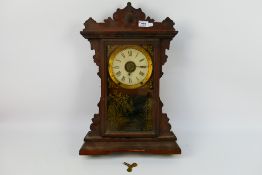 A Seth Thomas mantel clock with key and