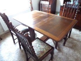 A 20th century drop leaf dining table, 73 cm (h) x 91 cm (w) x 27.